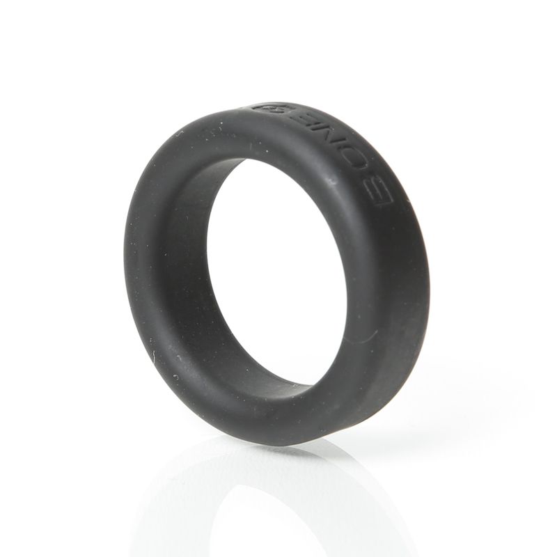 Boneyard 30mm black silicone cock ring, tilted side view of the rounded band edges