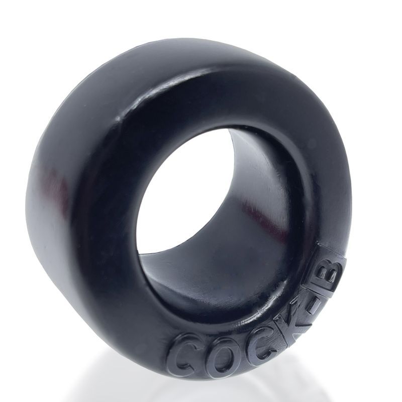 Angled view of the Black OxBalls Cock B ring and smooth rounded opening