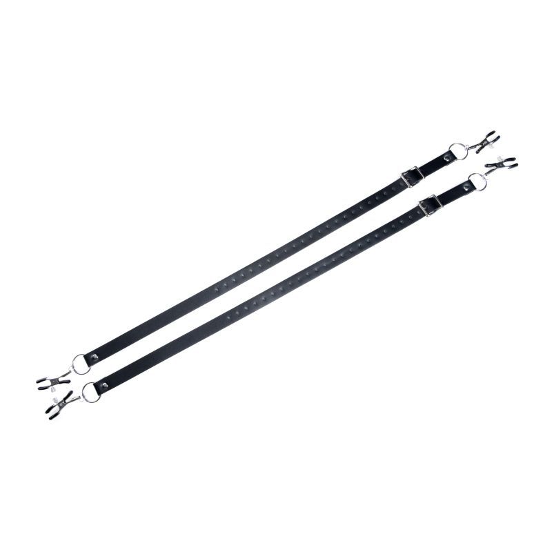 Full-length view of the two black Spread XL labia spreader straps with buckles and four attached clamps
