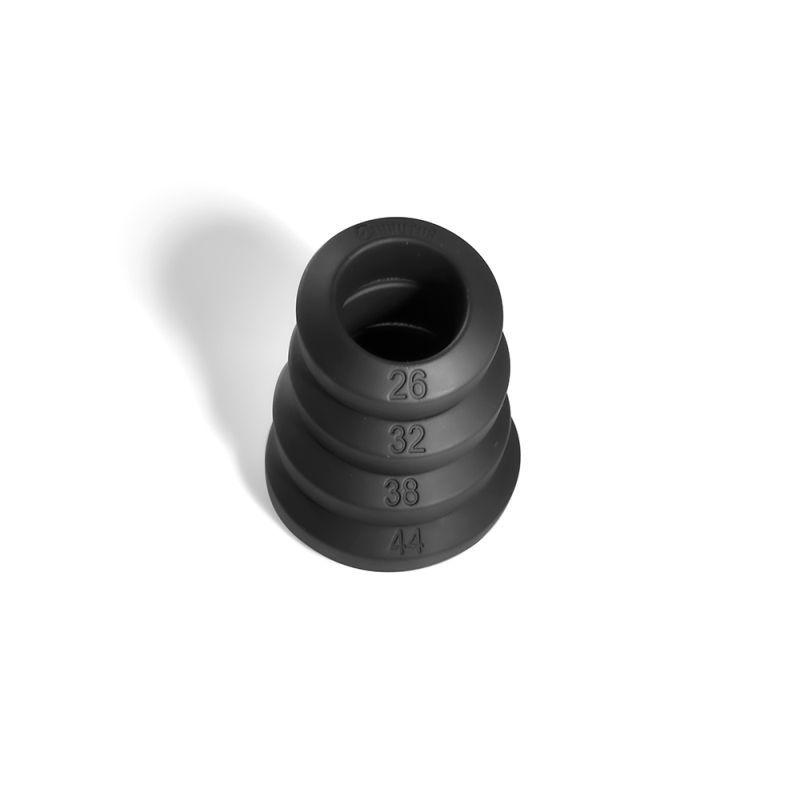 Four black Brutus Big Bulge silicone rings stacked in size order, with 26, 32, 38 and 44 markings visible