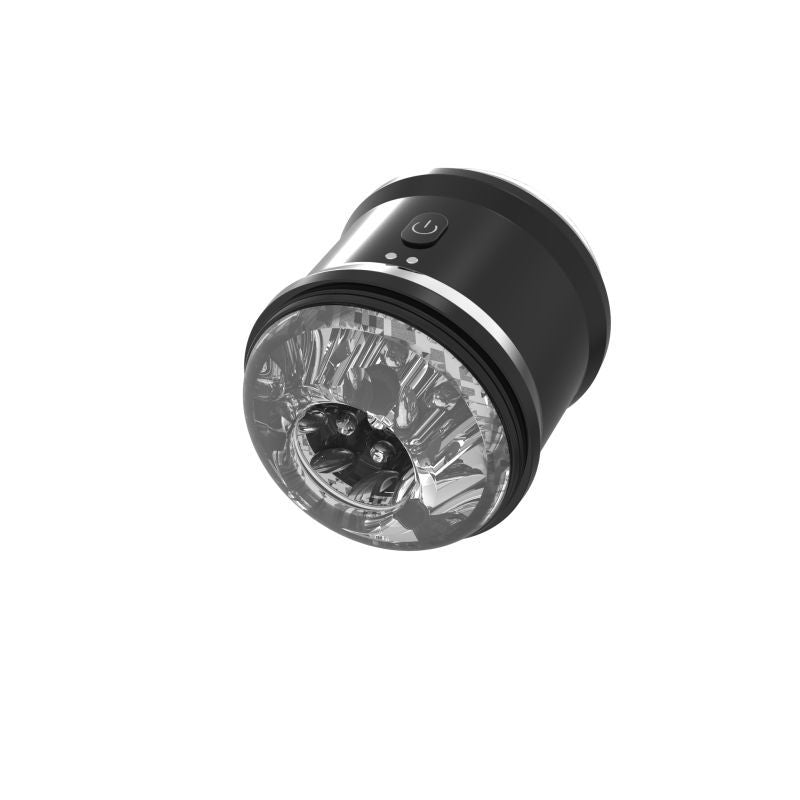Angled view of the Daytona Onyx vibrating stroker showing the textured clear sleeve opening