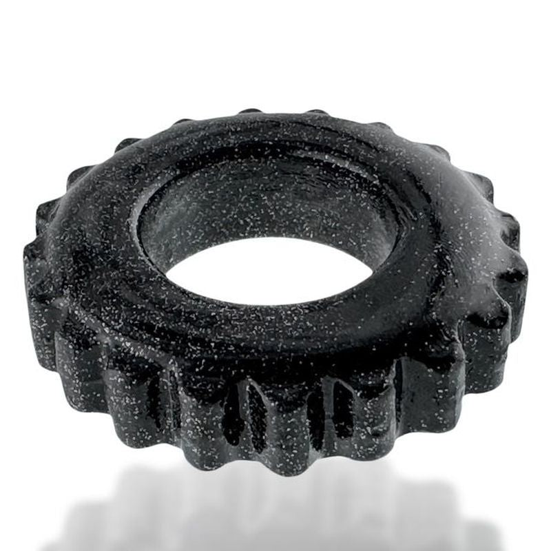 Angled view of the Black Plushy ring showing its broad face and rippled perimeter