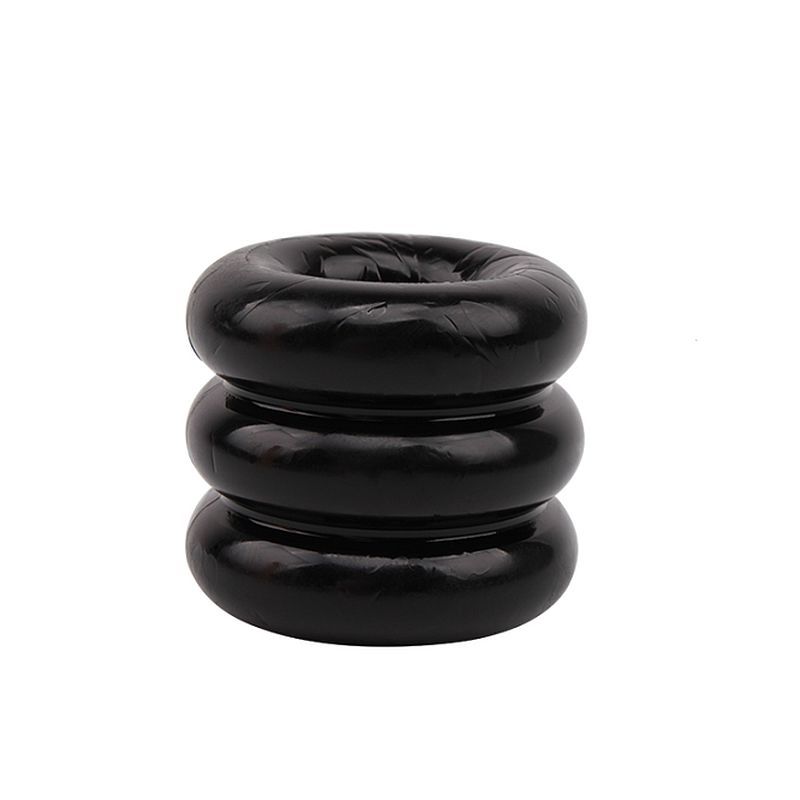 Upright view of the black GK Power Triad Triple Cock Ring showing three stacked rounded bands