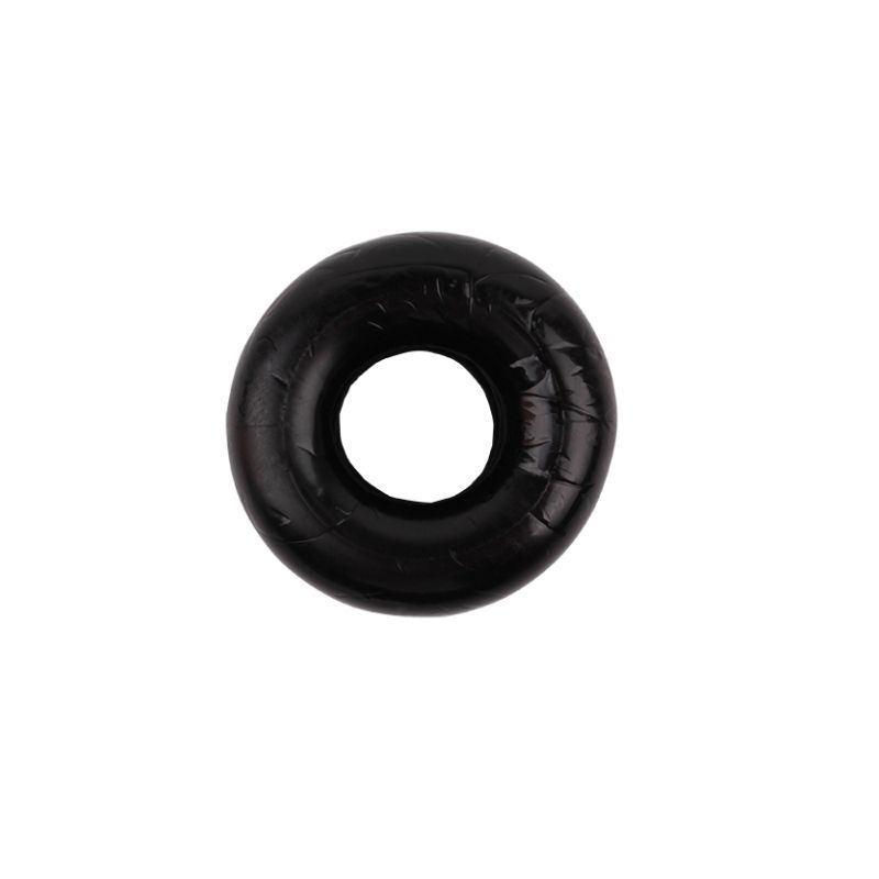End view through the central opening of the black GK Power Triad Triple Cock Ring