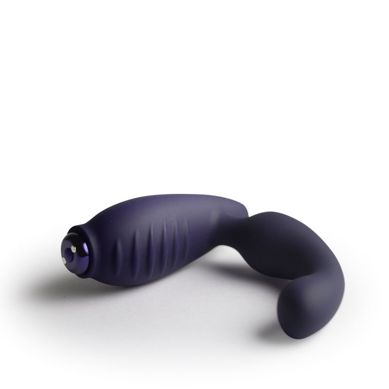 Side view of the Nova Sovereign showing its curved silicone shaft and external base