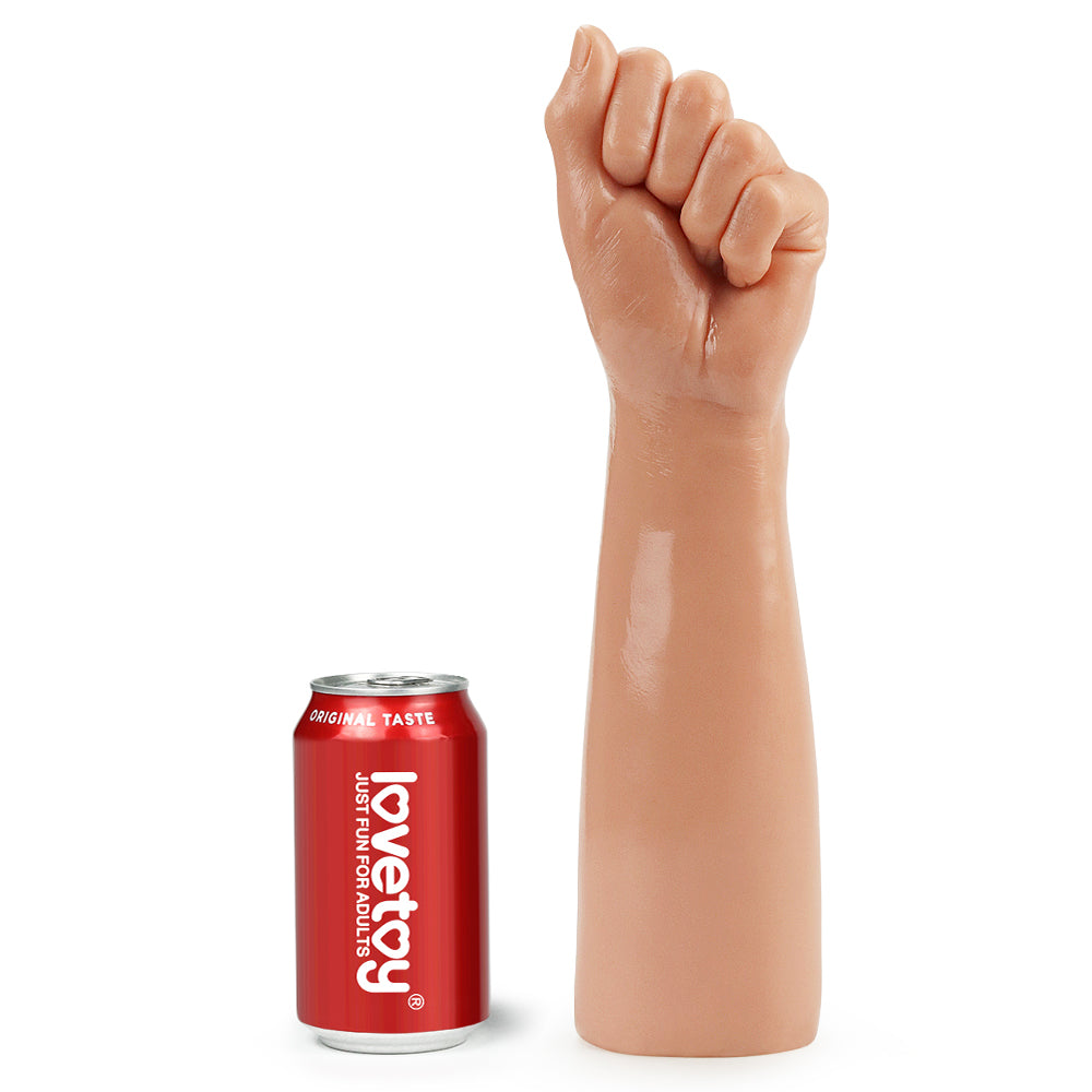 LoveToy Realistic Fist Dildo beside a red branded display can for scale