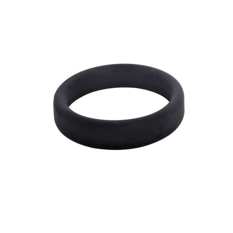 Angled view of the black Brutus Flat Slick silicone cock ring showing the broad flat band and rounded edges