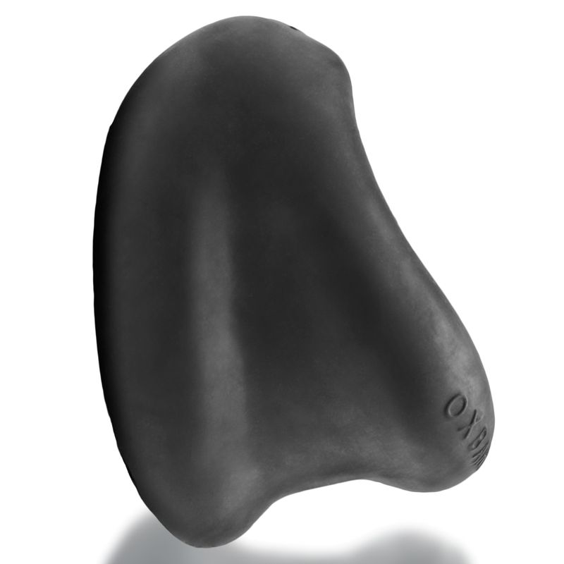 OxBalls Meat Night cock ring in black, side profile showing curved scoop shape