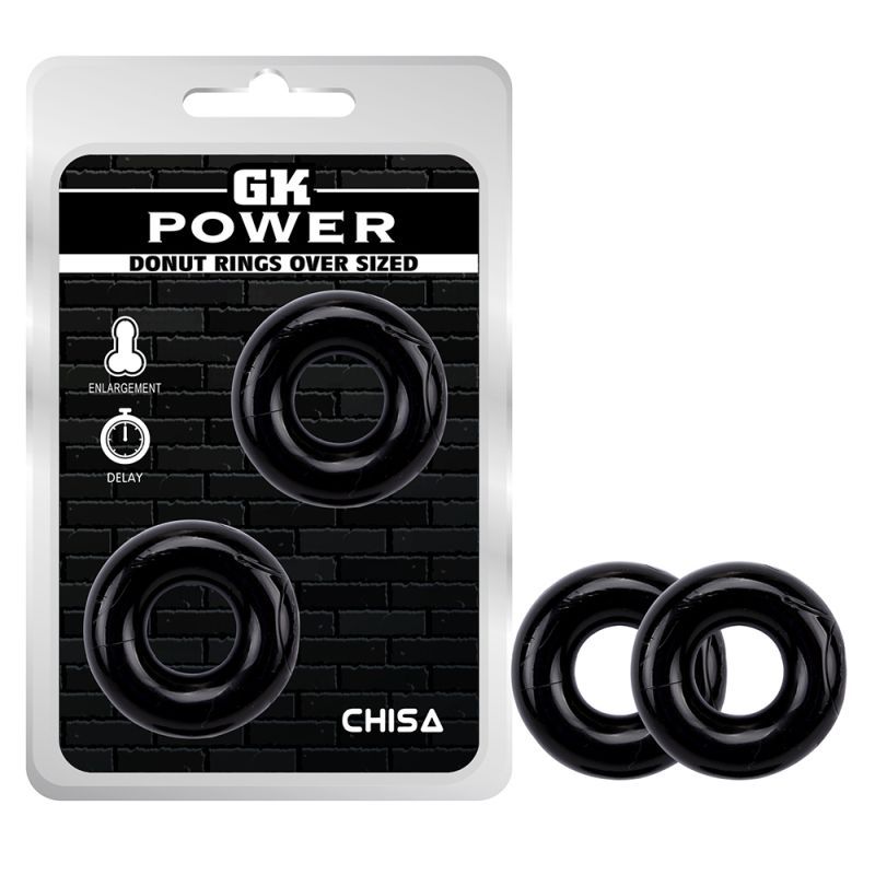 GK Power Donut Rings Over Sized retail packaging beside two separate black Mega Donut cock rings