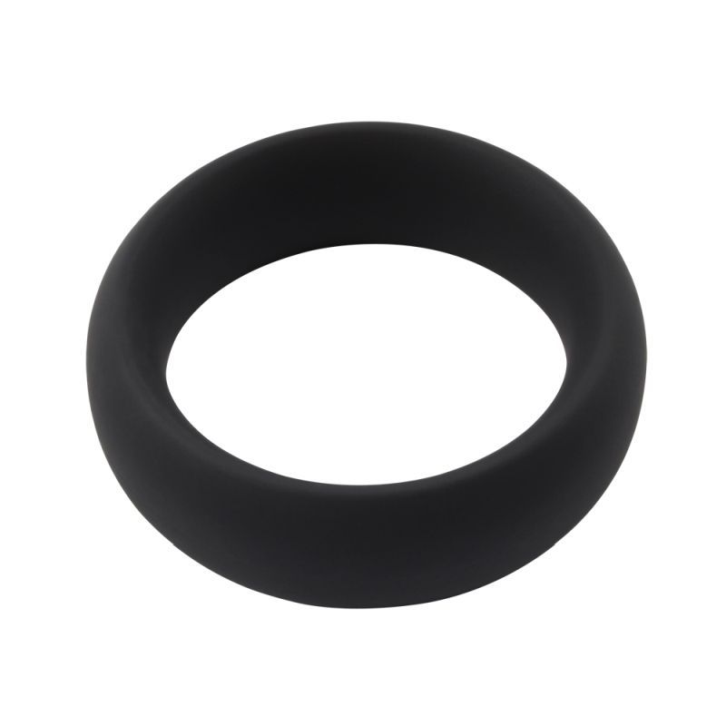 Angled view of the black GK Power Infinity Comfort Large silicone cock ring showing its broad flat band and curved edges