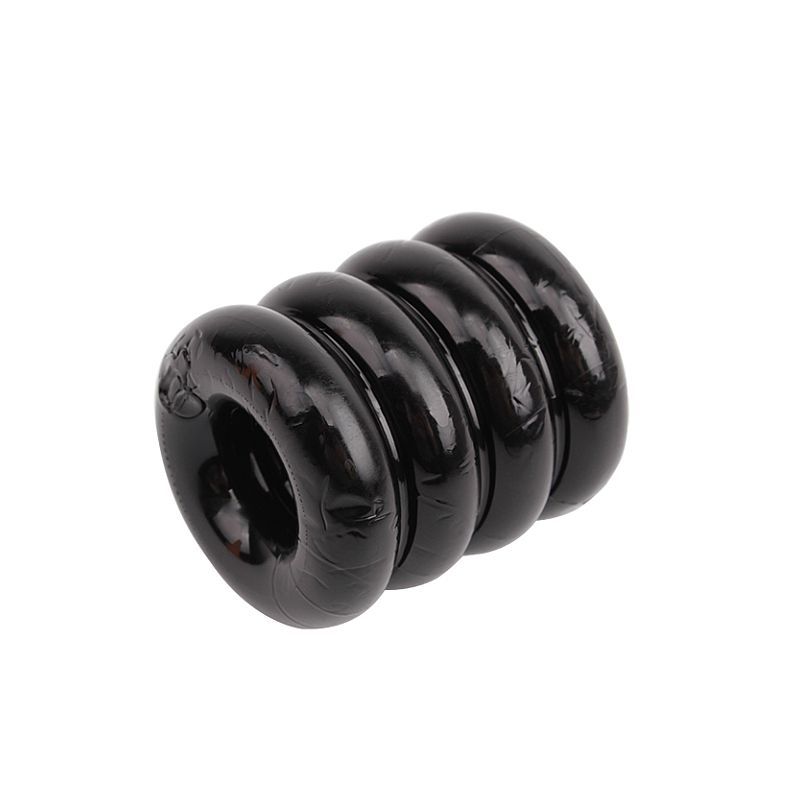 Angled view of the black GK Power Quadplay Four Band Cock Ring showing four joined rounded bands
