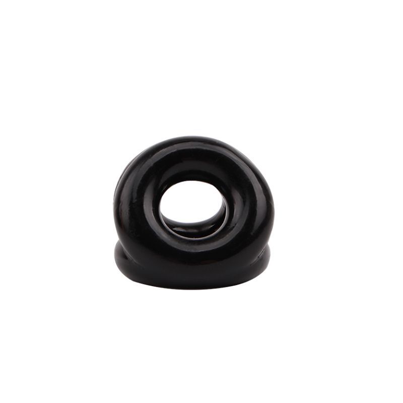 View through a rounded opening of the black GK Power Triangle Cock and Ball Ring
