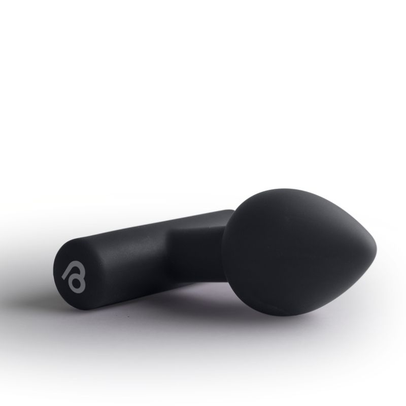 Side view of the black Nova Astryx showing its smooth rounded plug profile