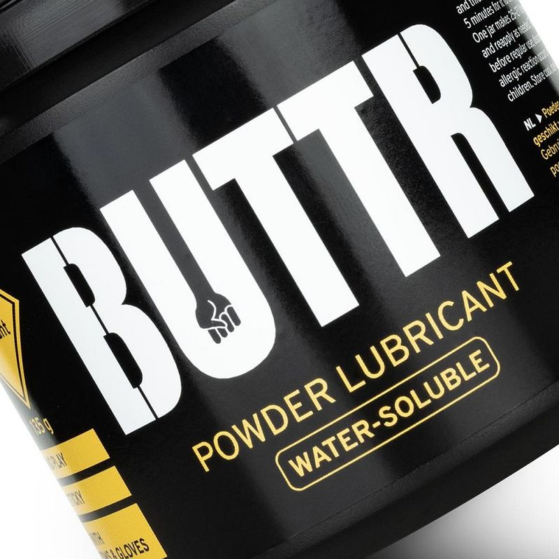 Close-up of the BUTTR tub label reading powder lubricant and water-soluble