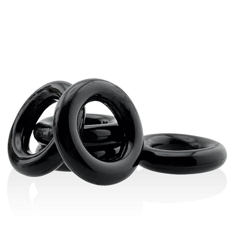 Hunkyjunk Jacker Stack Black five-ring set, loose ring arrangement showing the smooth rounded bands