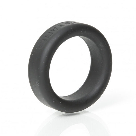 Angled view of the black Boneyard Silicone Cock Ring 30mm with rounded band edges